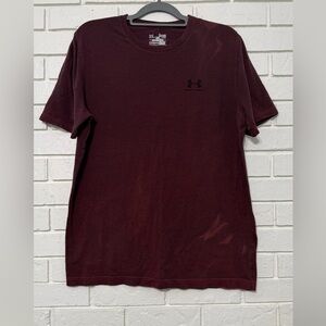 Men’s Under Armour with light bleaching. See pics. Medium